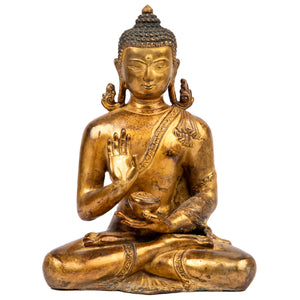 Buddha statue from Nepal  in antique medieval style. This statue was part of the exhibition in the Patan Museum: "The Revival of Newari Woodcarving, 2024".