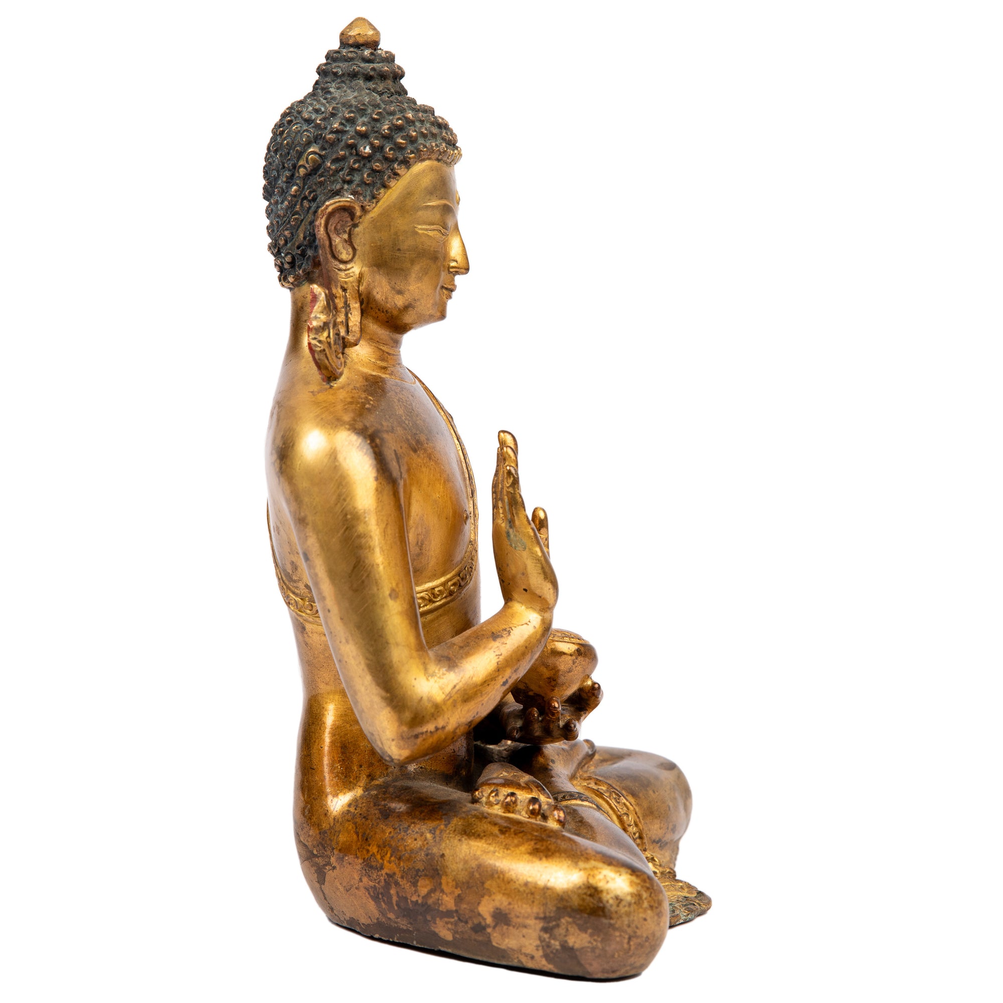 Buddha statue from Nepal  in antique medieval style. This statue was part of the exhibition in the Patan Museum: "The Revival of Newari Woodcarving, 2024".