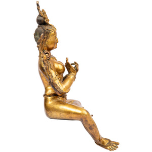 Bronze statue from Nepal in antique medieval style. Tara is one of the most important figures in Buddhism. She is a representation of the female aspect of Avalokiteshvara, the Buddha of Compassion. This statue was part of the exhibition in the Patan Museum: "The Revival of Newari Woodcarving, 2024".