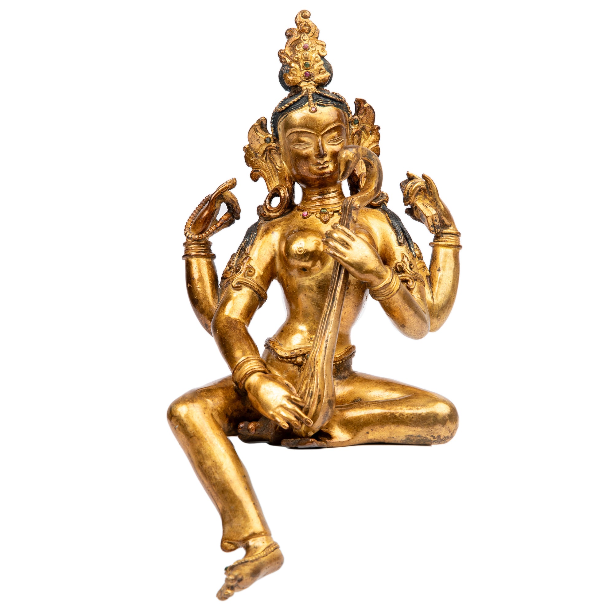 Bronze statue from Nepal in antique medieval style. Worshipped by Hindus as well as Buddhists, Saraswati is the goddess of art, knowledge, learning, wisdom and music.
