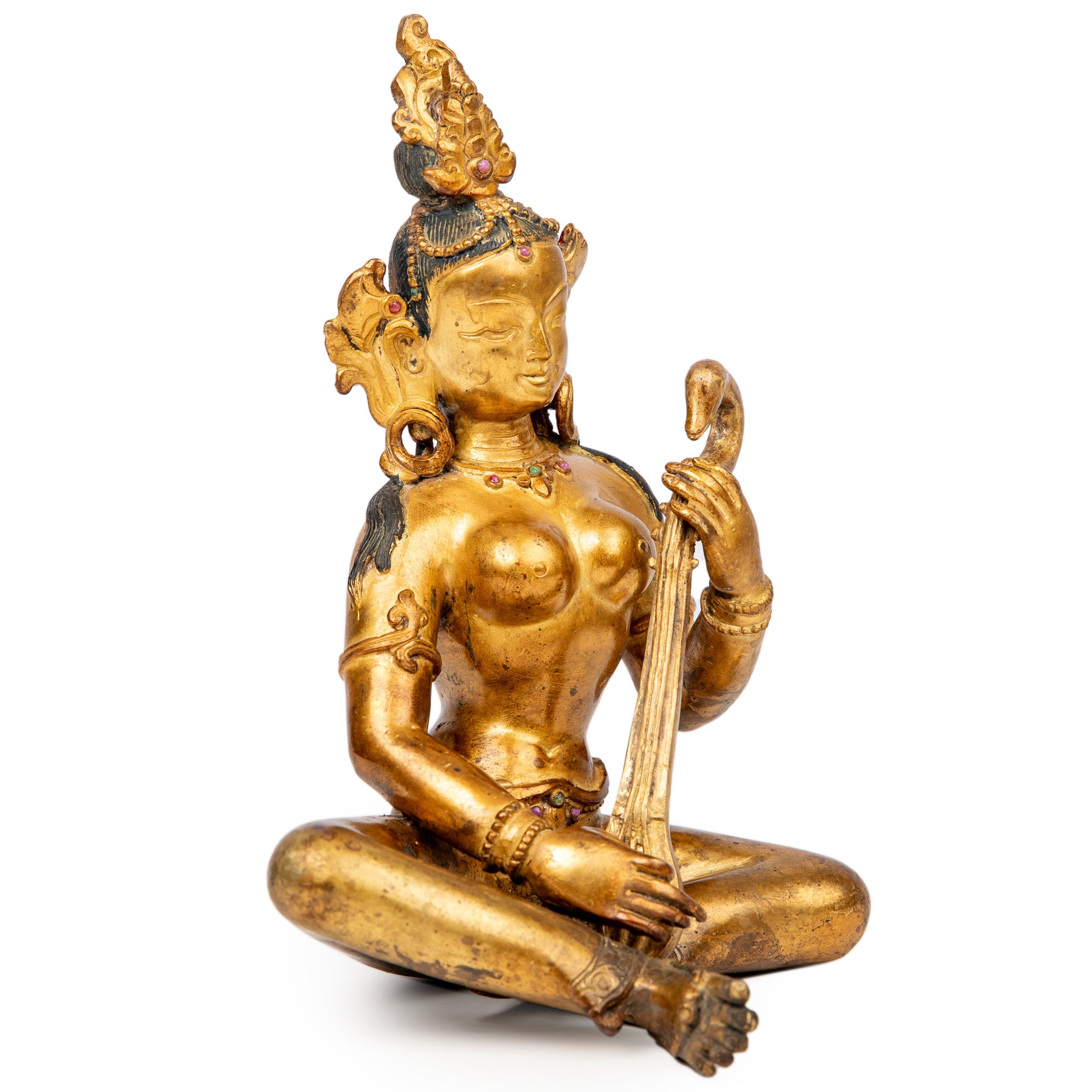 Bronze statue from Nepal in antique medieval style. Worshipped by Hindus as well as Buddhists, Saraswati is the goddess of art, knowledge, learning, wisdom and music.