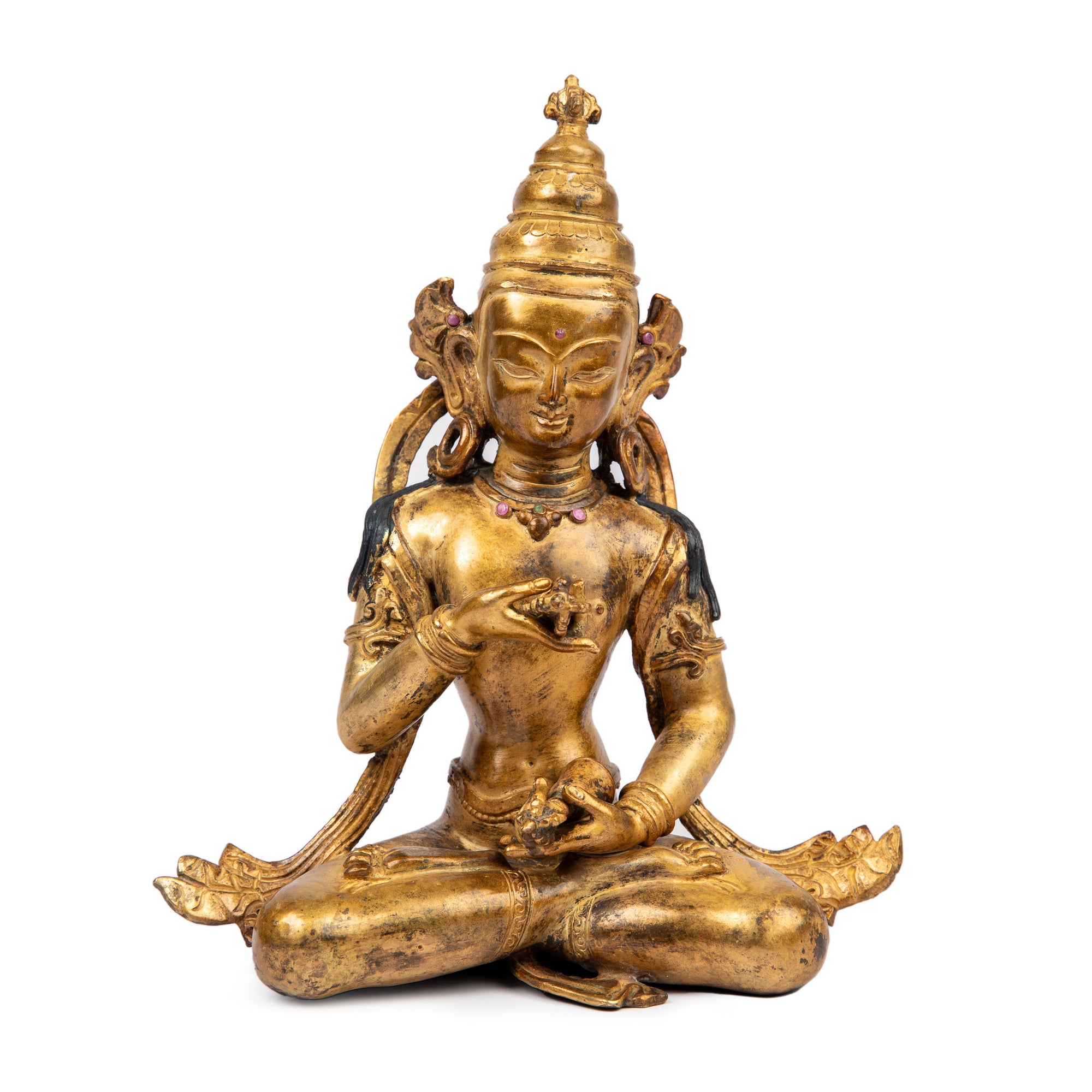 Bronze statue from Nepal, in antique medieval style. Gilded with 24 karat of gold and embellished with gem stones.
Vajradhara (holder of the diamond or thunderbolt) is considered as the primordial Buddha, supreme essence of all the Buddhas.