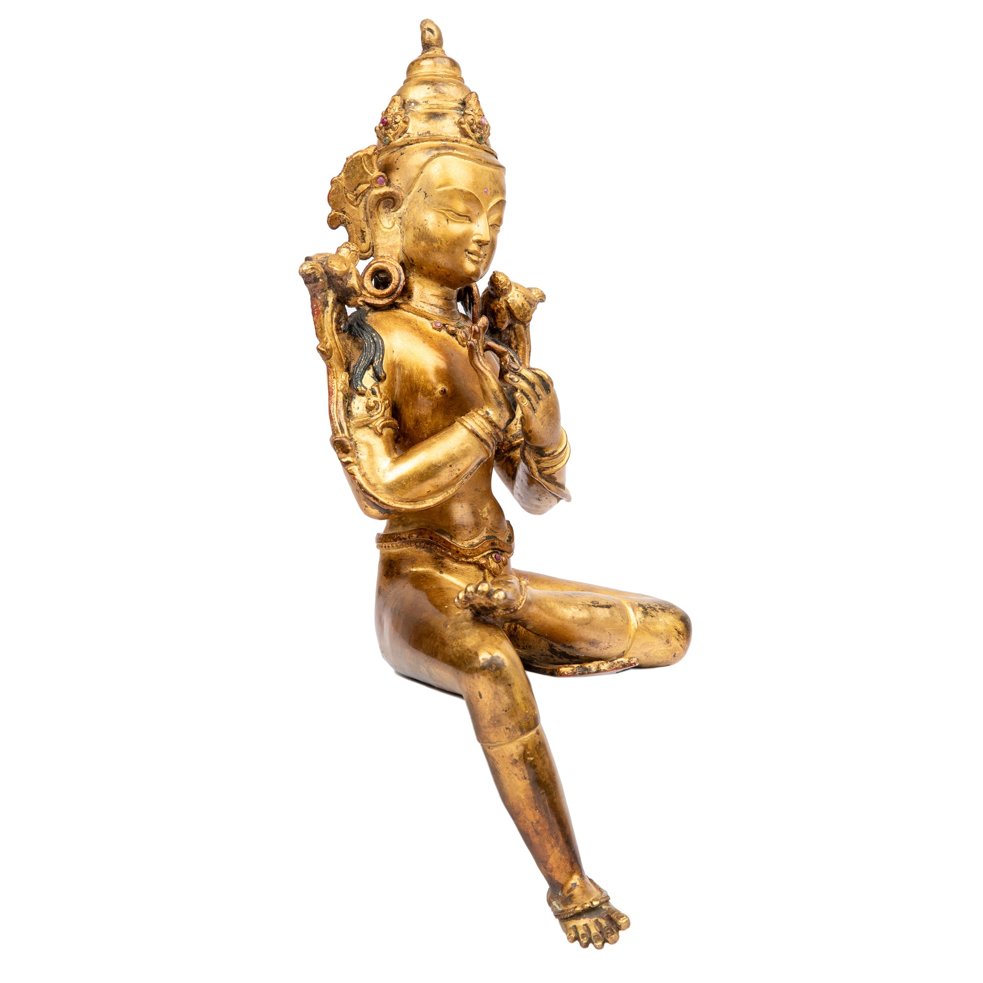 Bodhisattva in antique medieval style. Bronze from Nepal, gilded with 24 karat of gold and embellished with gem stones.