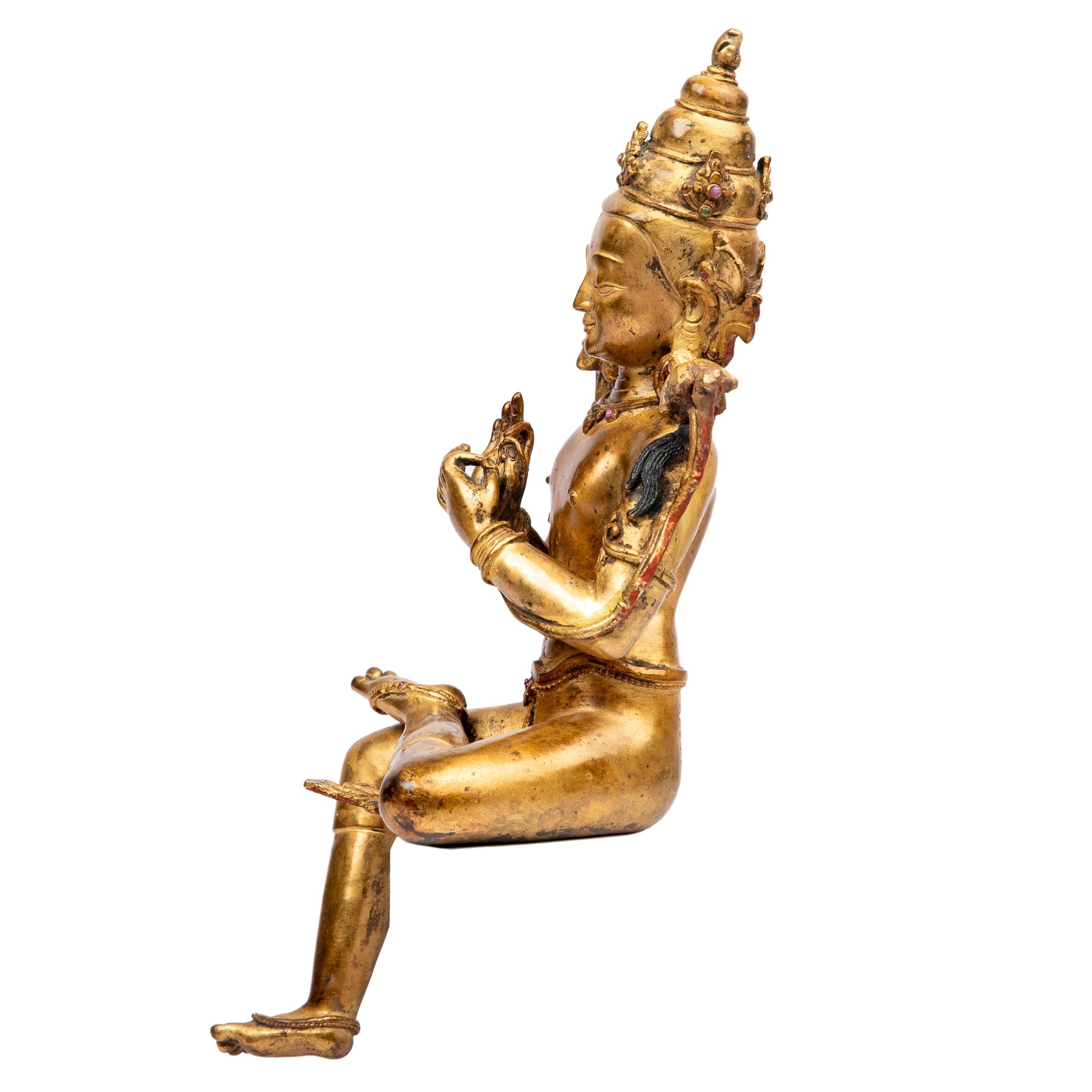 Bodhisattva in antique medieval style. Bronze from Nepal, gilded with 24 karat of gold and embellished with gem stones.