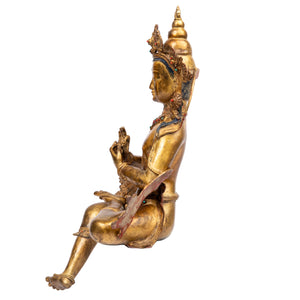 Bodhisattva in antique medieval style. Bronze from Nepal, gilded with 24 karat of gold and embellished with gem stones.