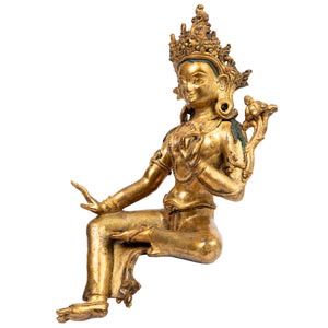 Bronze statue from Nepal in antique medieval style. Tara is one of the most important figures in Buddhism. She is a representation of the female aspect of Avalokiteshvara, the Buddha of Compassion. This statue was part of the exhibition in the Patan Museum: "The Revival of Newari Woodcarving, 2024".