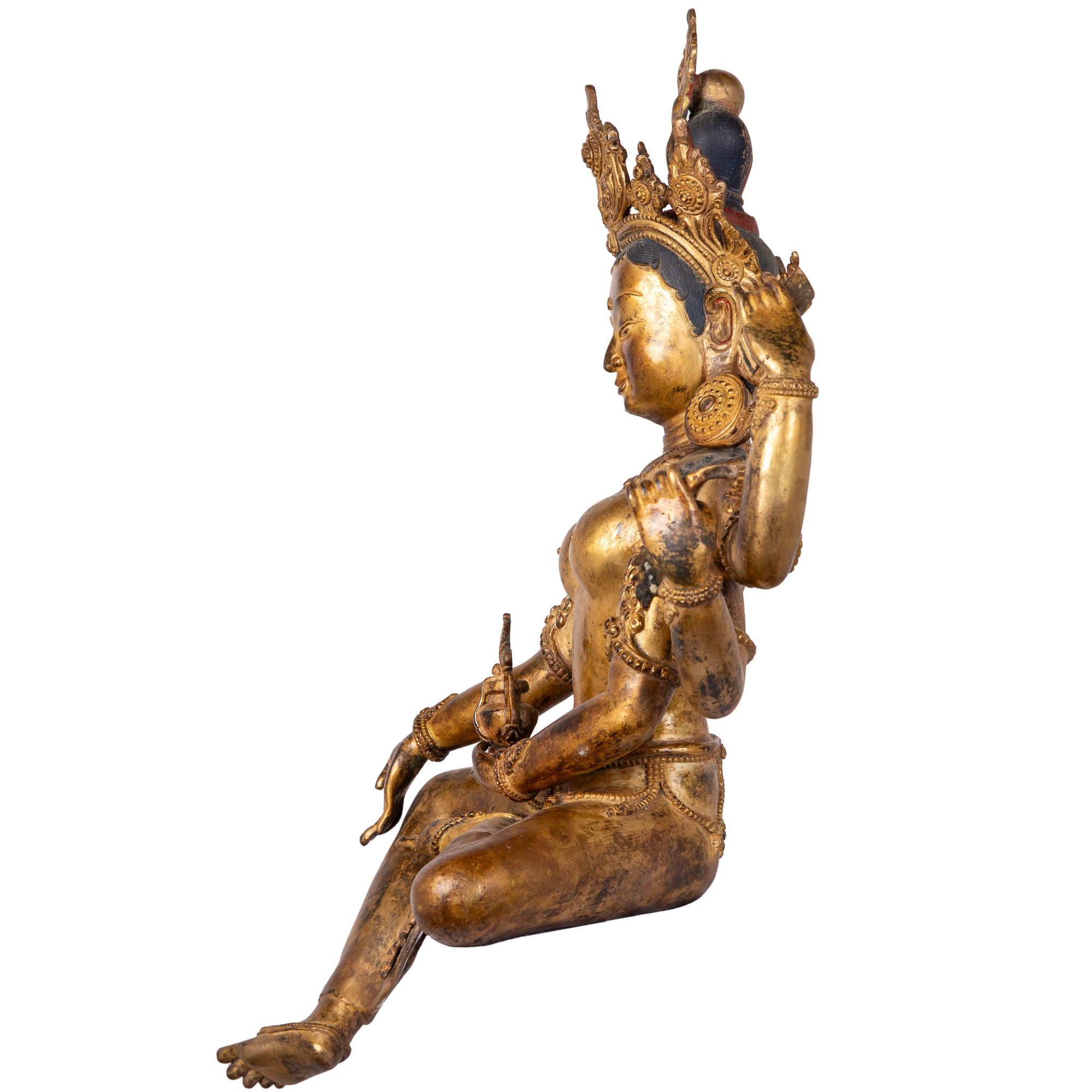 Bronze statue in antique medieval style. Buddhist goddess of prosperity, Basundhara (whose name means “Bearer of Treasure”) is associated with material and spiritual abundance. This statue was part of the exhibition in the Patan Museum: "The Revival of Newari Woodcarving, 2024".