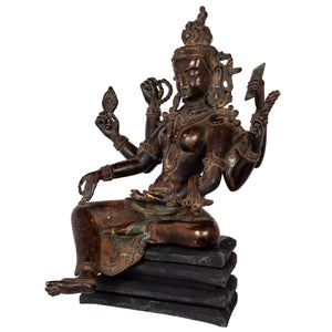 Bronze statue in antique medieval style. Buddhist goddess of prosperity, Basundhara (whose name means “Bearer of Treasure”) is associated with material and spiritual abundance. This statue was part of the exhibition in the Patan Museum: "The Revival of Newari Woodcarving, 2024".