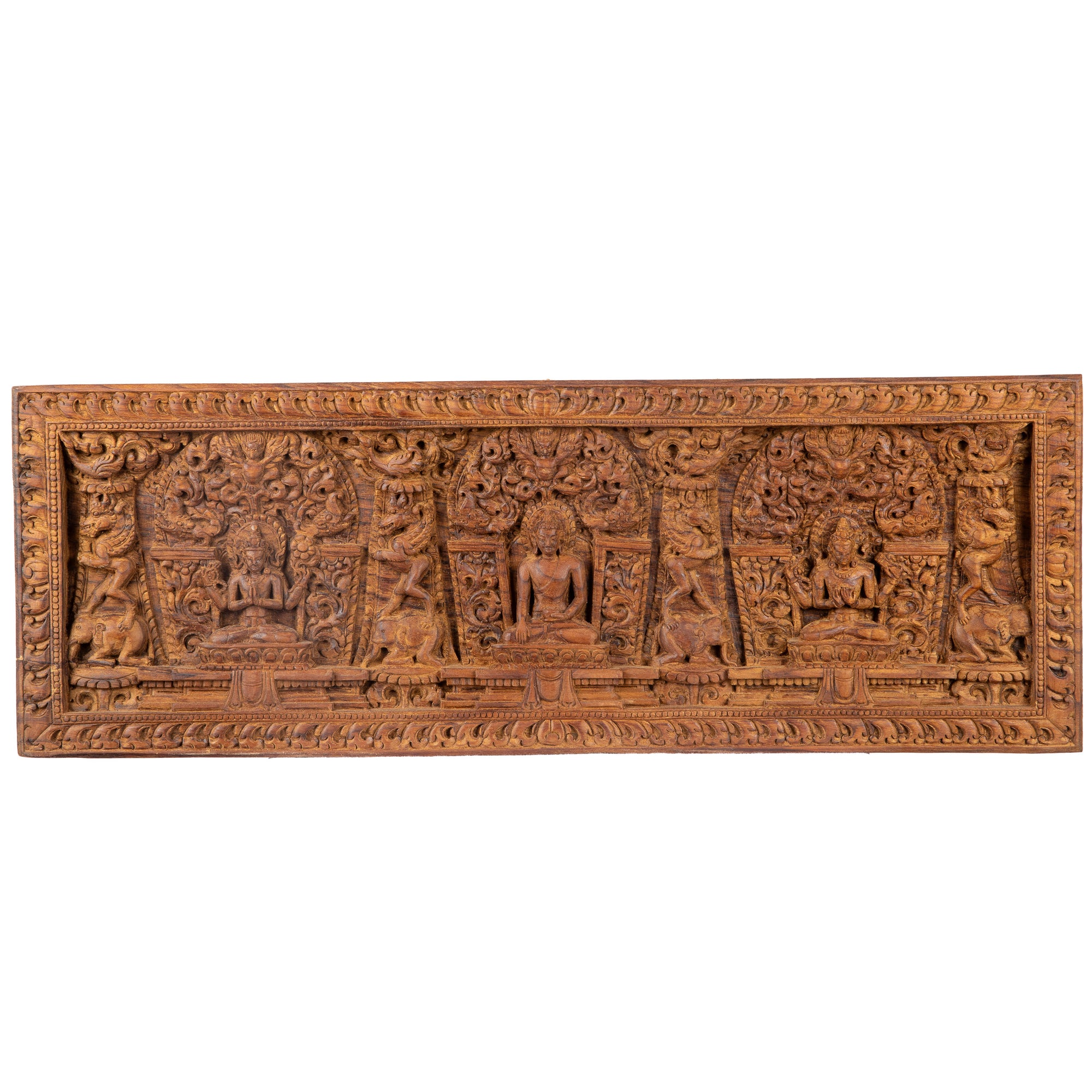 Woodcarving from Nepal. Shakyamuni Buddha is surrounded by Lokeshwor, the Compassion Bodhisattva.This pannel was part of the exhibition in the Patan Museum: "The Revival of Newari Woodcarving, 2024".
