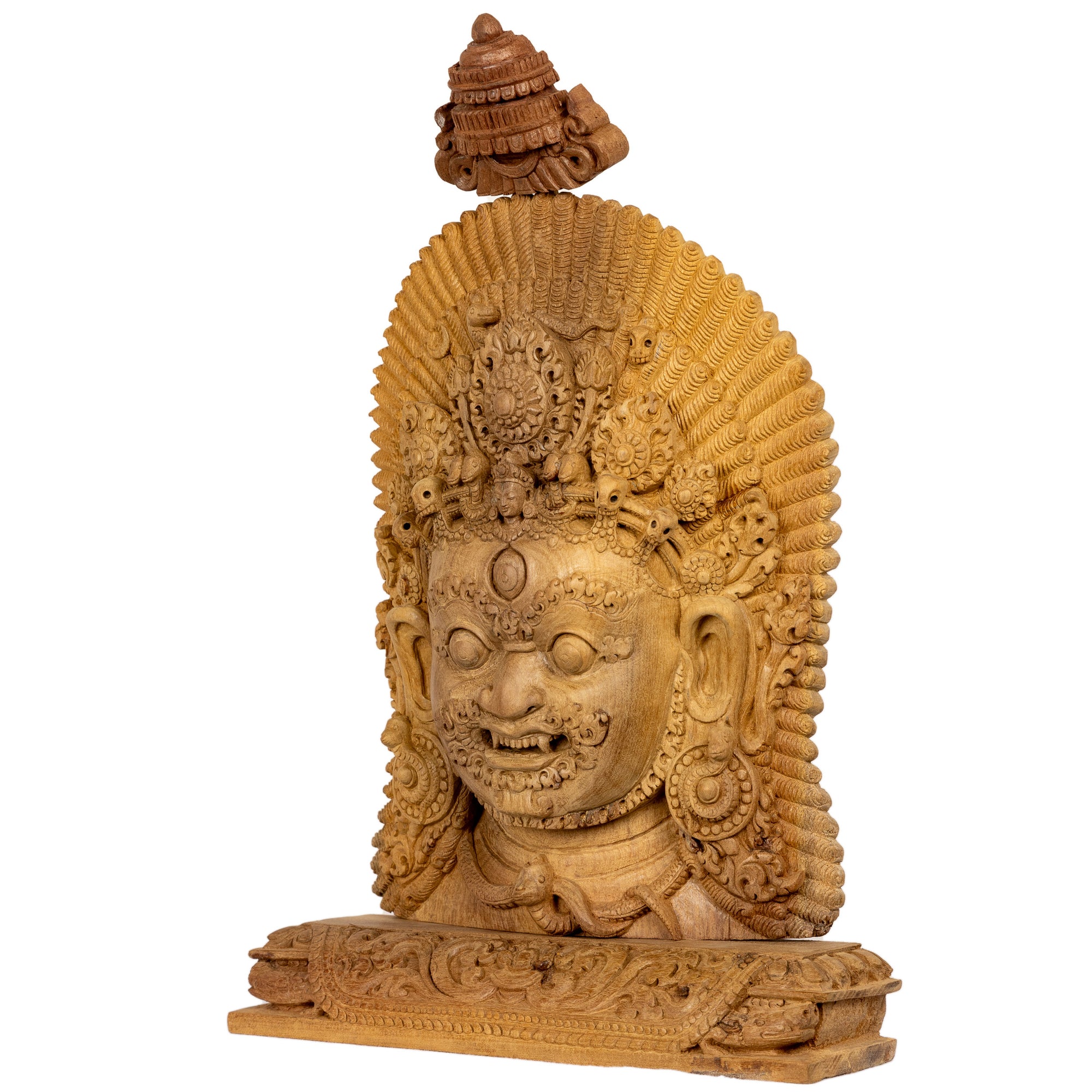 Bhairav is a wrathful manifestation of the god Shiva. He is one of the main deity worshipped by the Newars of the Kathmandu Valley (Hindus as well as Buddhists). This statue was part of the exhibition in the Patan Museum: "The Revival of Newari Woodcarving, 2024".