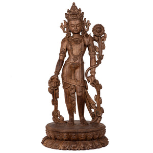 Woodcarving from Bhaktapur, Nepal. Padmapani (“The Lotus-Bearer”)  is an emanation of Avalokiteshwara, the Boddhisattva of Compassion. This statue was part of the exhibition in the Patan Museum: "The Revival of Newari Woodcarving, 2024".
