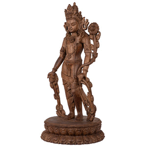 Woodcarving from Bhaktapur, Nepal. Padmapani (“The Lotus-Bearer”)  is an emanation of Avalokiteshwara, the Boddhisattva of Compassion. This statue was part of the exhibition in the Patan Museum: "The Revival of Newari Woodcarving, 2024".