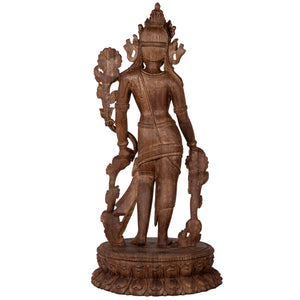 Woodcarving from Bhaktapur, Nepal. Padmapani (“The Lotus-Bearer”)  is an emanation of Avalokiteshwara, the Boddhisattva of Compassion. This statue was part of the exhibition in the Patan Museum: "The Revival of Newari Woodcarving, 2024".