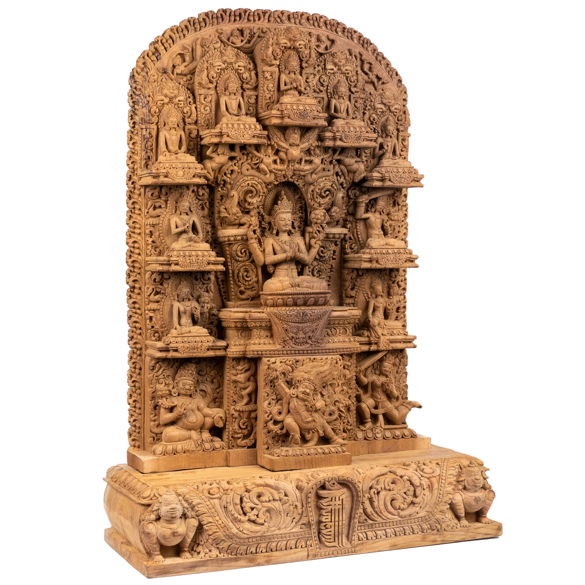 Woodcarving from Bungmati, Nepal. Shadakshari Lokeshvara (the Lord of the Six Syllabes) is a manifestation of Avalokiteshvara, the Bodhisattva a of Compassion. This magnificent relief on Magnolia Champaca is a slightly modified replica of a relief, which won the Nepalese National Fine Arts Prize in 2020. This statue was part of the exhibition: "The Revival of Newari Woodcarving, 2024".