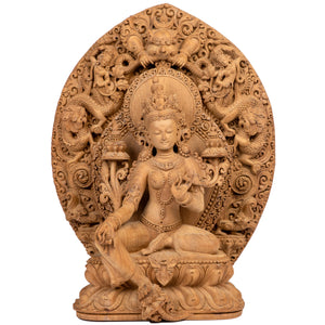 Woodcarving from Bhaktapur, Nepal. 
Tara is one of the most important figures in Buddhism. She is a representation of the female aspect of Avalokiteshvara, the Buddha of Compassion. This statue was part of the exhibition in the Patan Museum: "The Revival of Newari Woodcarving, 2024".
