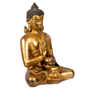 Right side view highlighting serene profile and balanced seated pose.