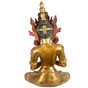 Crowned bodhisattva gilt copper statue back view Himalayan art Nepal