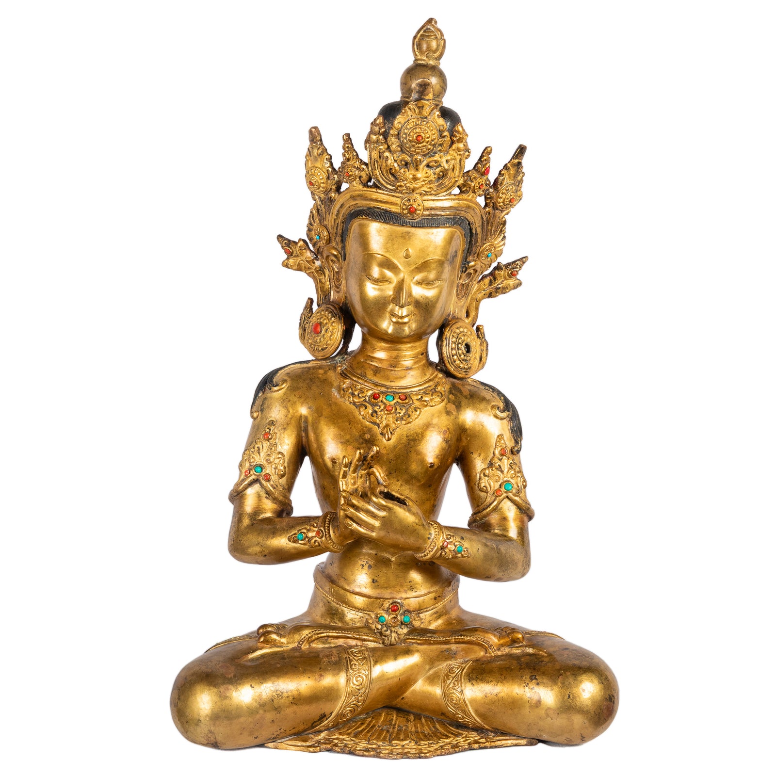 Crowned bodhisattva dharmachakra mudra gilt copper statue with stone inlays Himalayan art Nepal front view