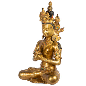 Crowned bodhisattva teaching mudra gilt copper statue side view Himalayan art Nepal