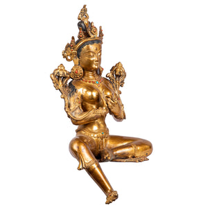 Right side view highlighting lotus and dharmachakra mudra.