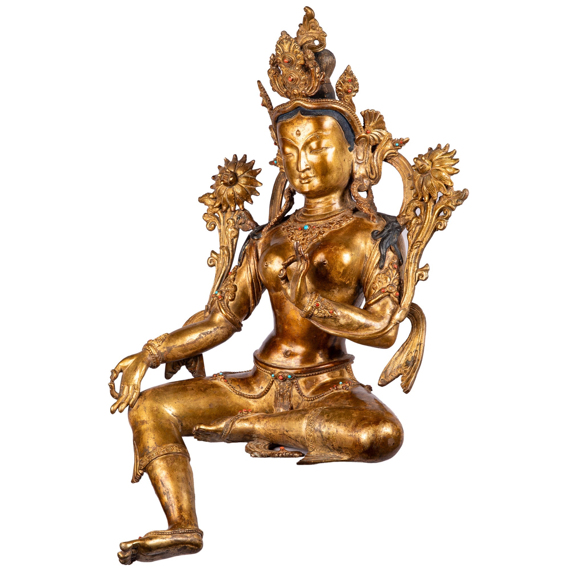 Green Tara bronze statue — left side view showing the graceful posture, ornaments.