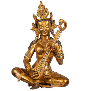 Laxmi bronze statue 44cm, 9.495kg — front view, gilded with 24K gold and adorned with semi-precious stones, holding vina, symbol of harmony and prosperity.