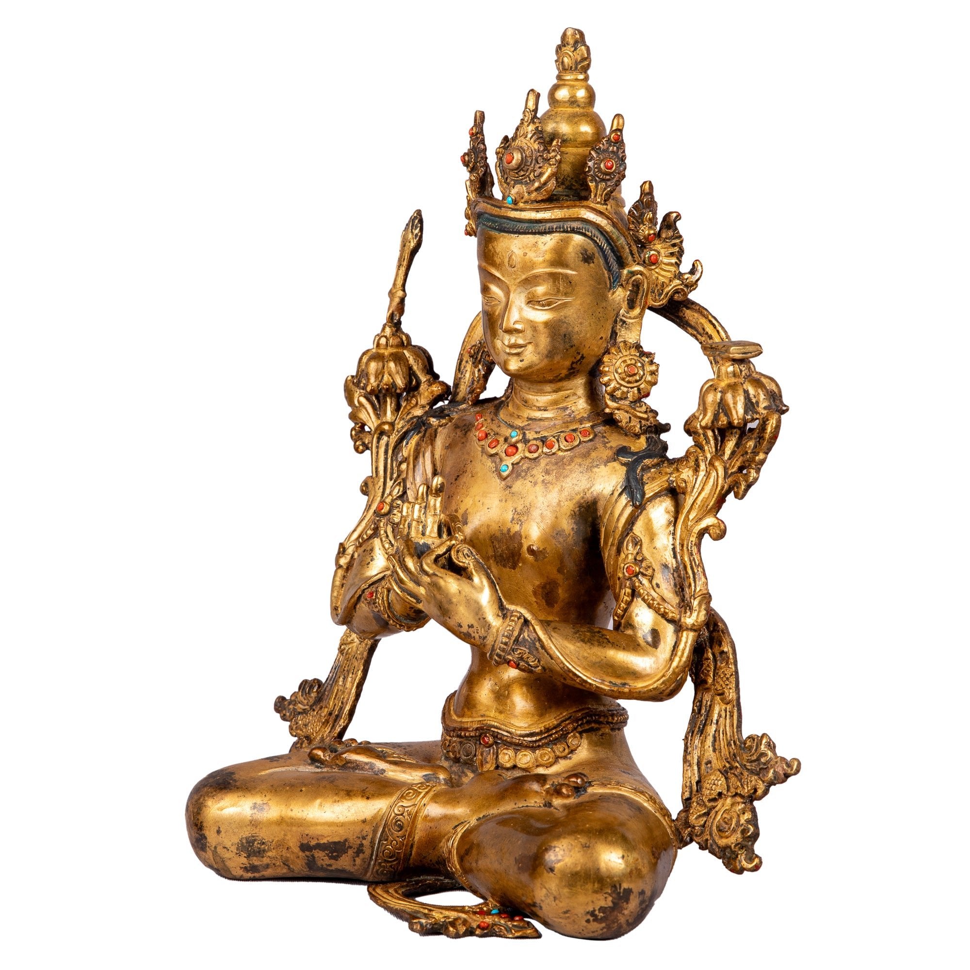 Manjushree bronze statue — left side view showing detailed ornaments and the sword of wisdom.