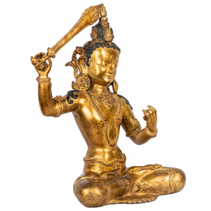 Manjushri bronze statue left side bodhisattva of wisdom Nepal sculpture