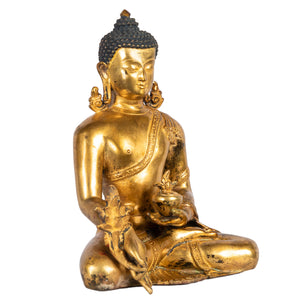 Medicine Buddha Bhaisajyaguru healing Buddha gilt copper bronze statue angle view Himalayan art Nepal