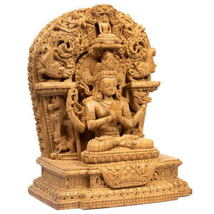 Right side view highlighting manuscript and gestures of teaching.