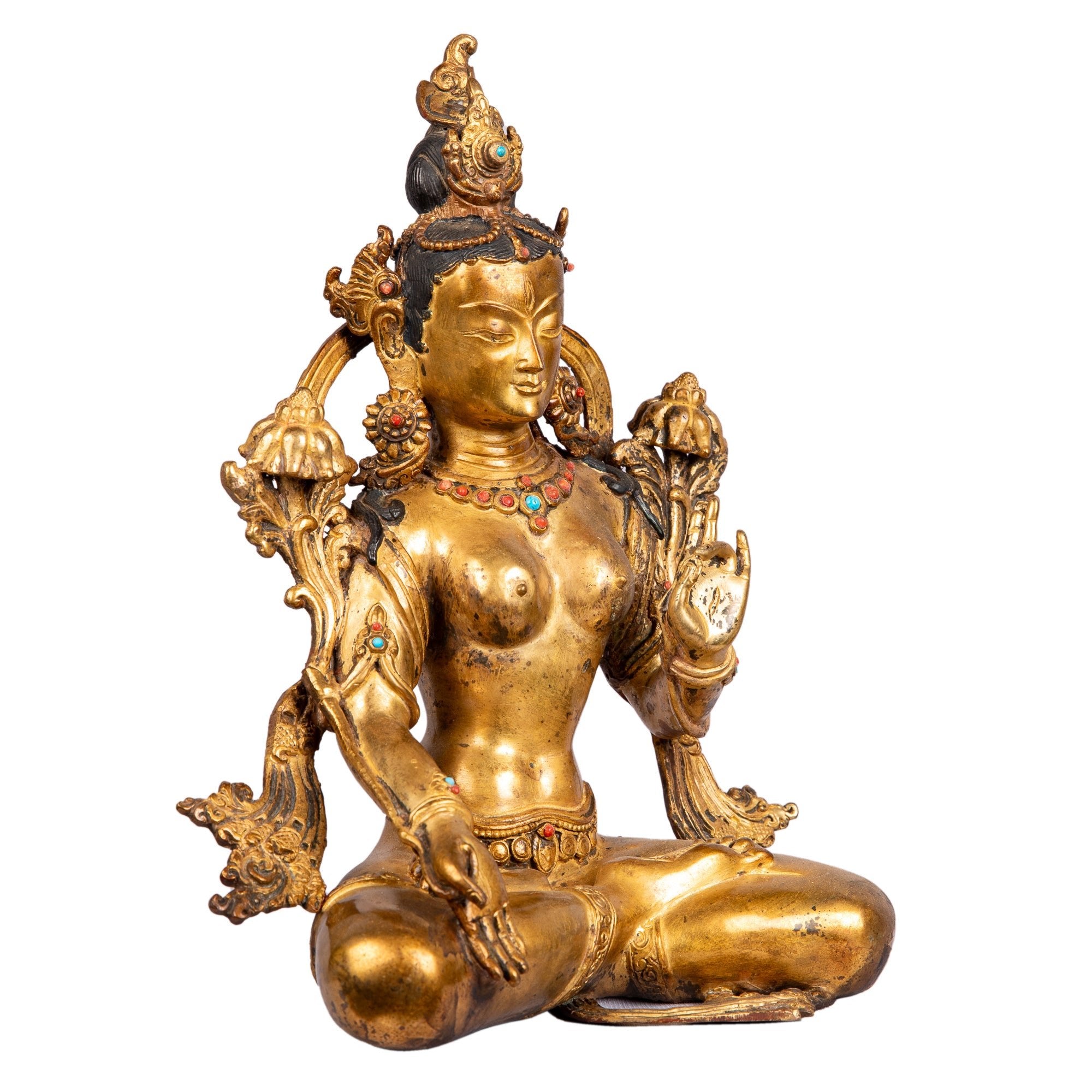 Right side view highlighting ornaments and serene expression.