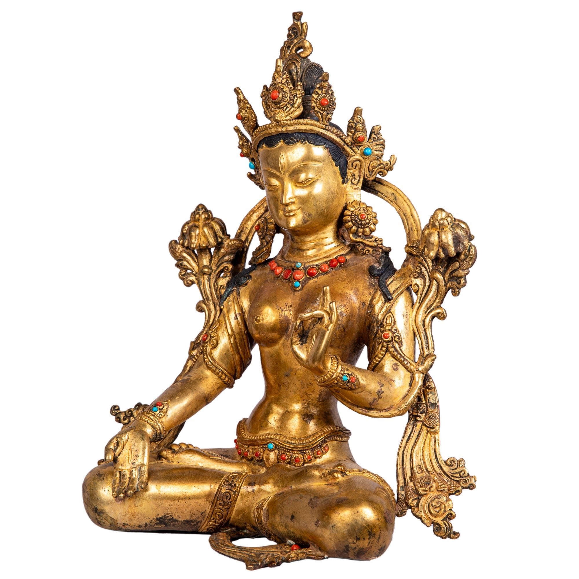 White Tara bronze statue — left side view showing ornaments.