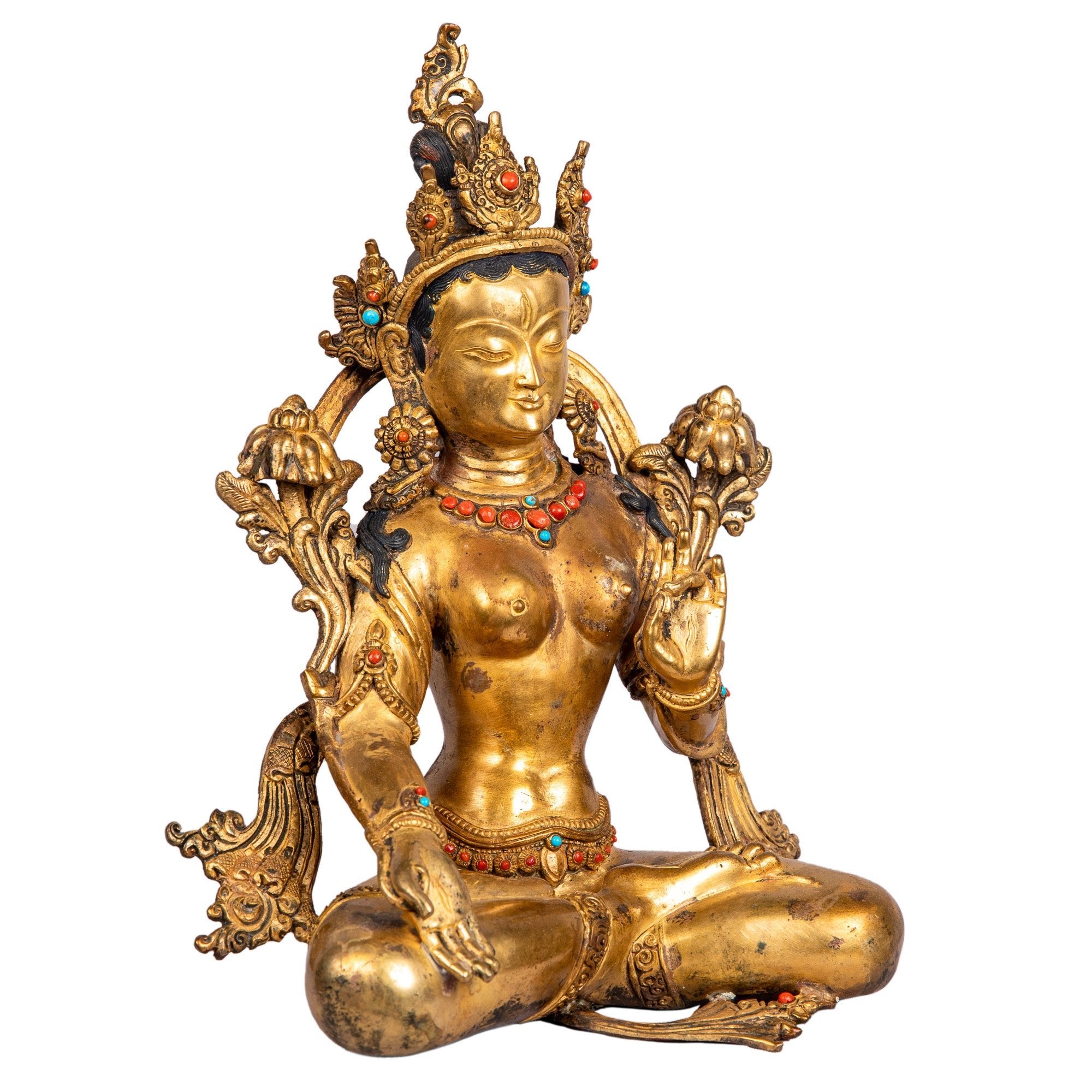 White Tara bronze statue — right side view highlighting hand gestures and details of the crown.